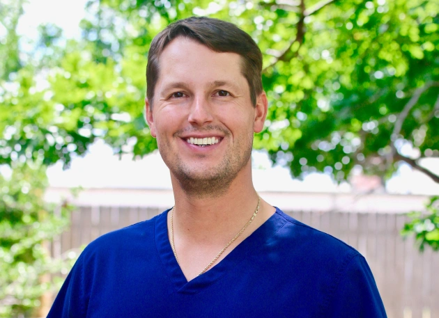 Smiling portrait of Dr. David Lawrence at Warwick Dental in Oklahoma City